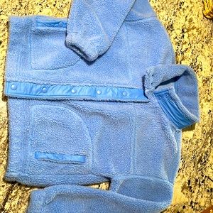 Beautiful blue Sherpa jacket. Button snaps. Like new. Short style.